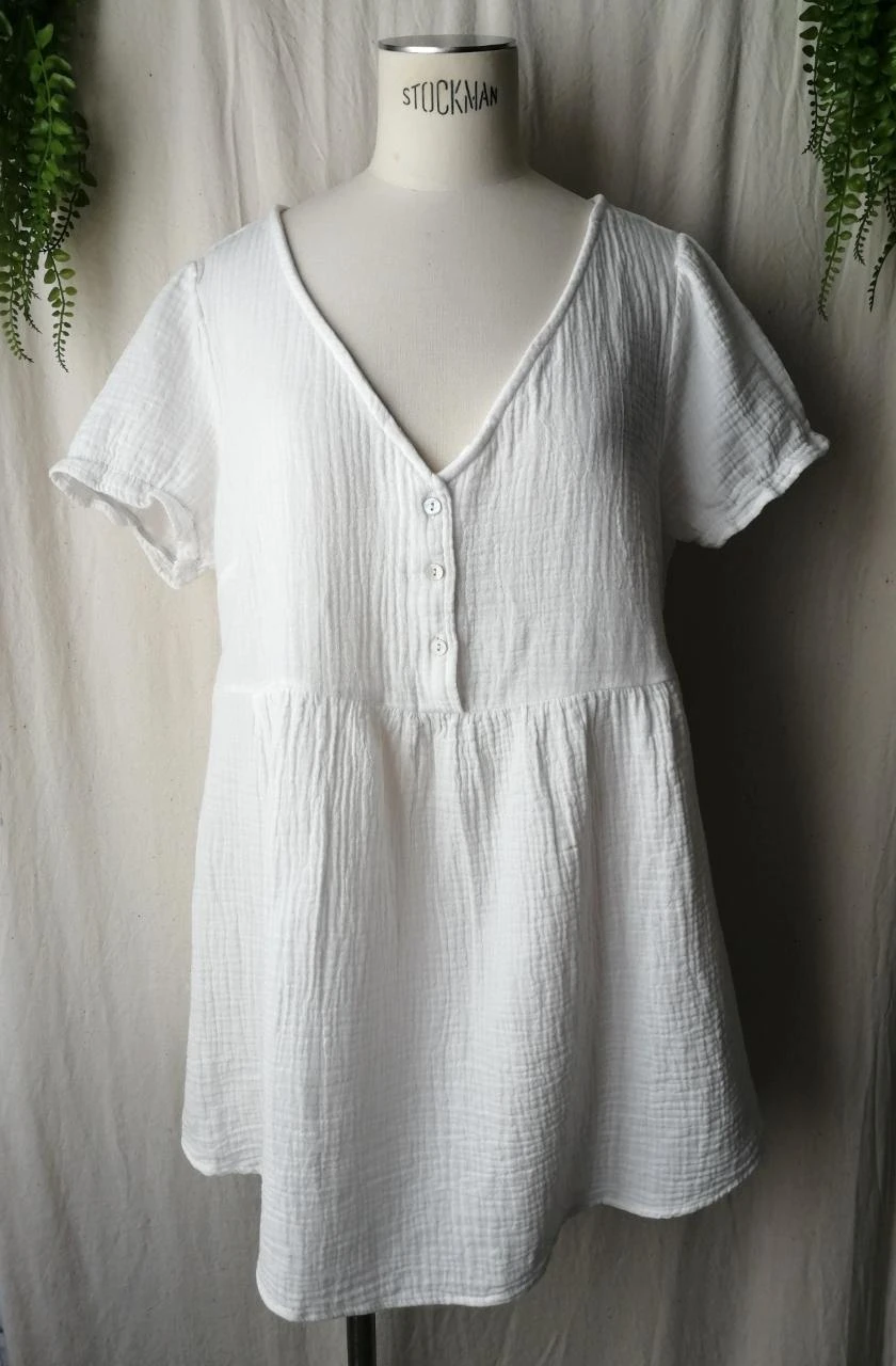 Blouse blanche coupe babydoll gaze de coton texturé "Kiabi"